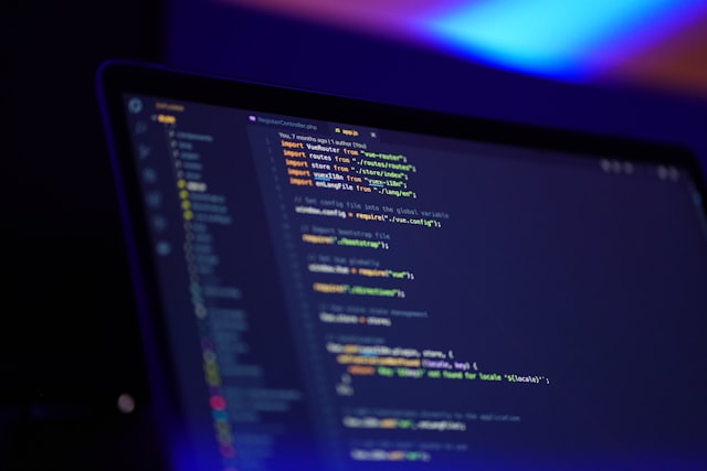 Dark code editor on a laptop