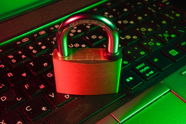Padlock on a keyboard in green light